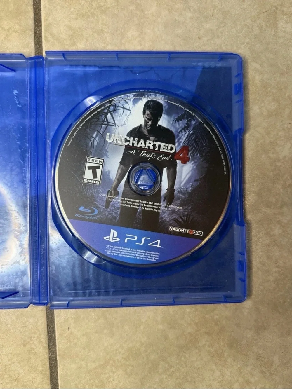 Uncharted 4: A Thief's End PS4 Game Disc - Blue